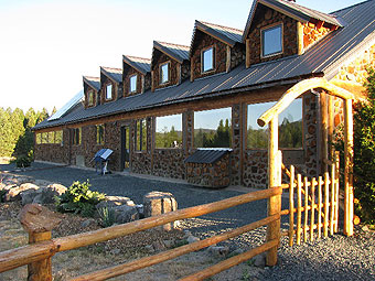 The south-facing wall of Sage Mountain Center contains about 50 percent glass to capture the sun's heat in chilly Montana winters.