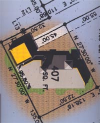Passive solar residence on plot plan, with shadows.