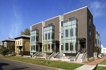 Merchant's Row boldly holds the street corner. 