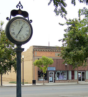 Downtown Corcoran: corner clock and street retail.