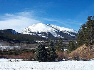 Buffalo Mountain beyond the Frisco valley in wintertime. 