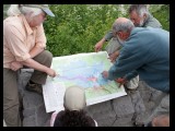 Fred Swanson points out the paths of blowdown winds from the eruption as Science Pulse writers prepare to hike down to Spirit Lake.