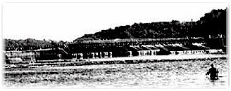 An early photograph of the rock-and-timber Edwards Dam