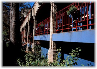 Outdoor Seating for a Restaurant Lining the River Walk.  Photo by S. Buntin.