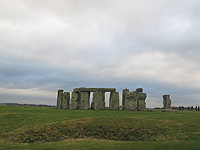 The scale of the outer ring of stones, called sarcen stones, is more clearly understood when people are also part of the photograph. The circle itself is about 100 feet across.